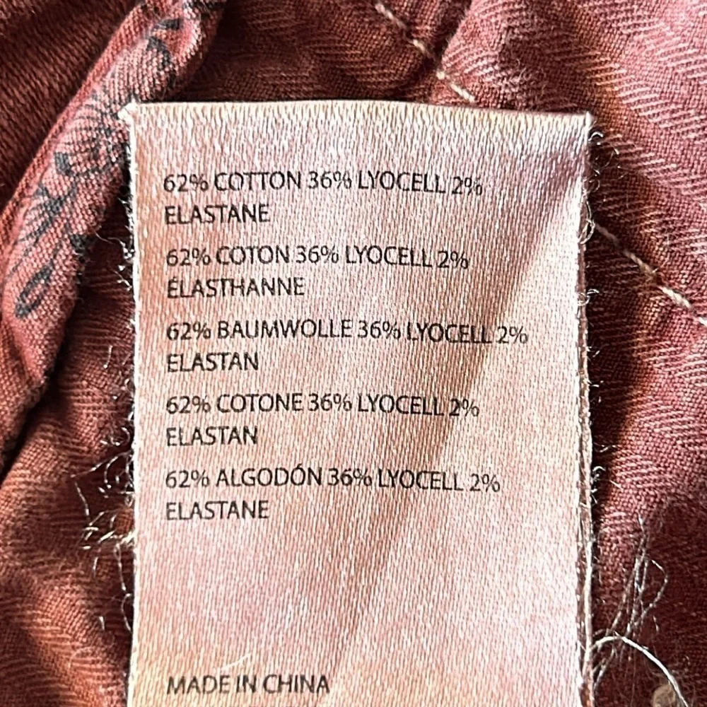 By Anthropologie size 6 raw hem baggy pants in mauve color